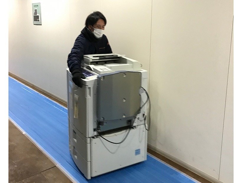 神奈川県横浜市のインテリジェントビル内に構えた大規模オフィスから印刷機を回収